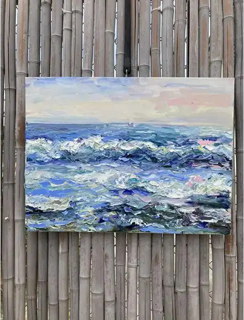 Impressionist painting of ocean waves under a soft sky.