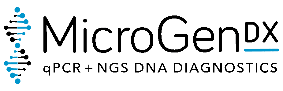Microscope focusing on DNA sequencing slide with colorful lights.
