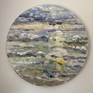 A painting of the ocean on a round canvas.