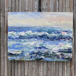 A painting of the ocean waves on a bamboo fence