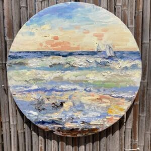 A painting of the ocean on a round canvas.